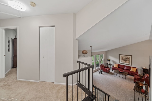2243 Camden Ln, Hanover Park, IL 60133 - hallway featuring an upstairs landing, carpet flooring, and vaulted ceiling