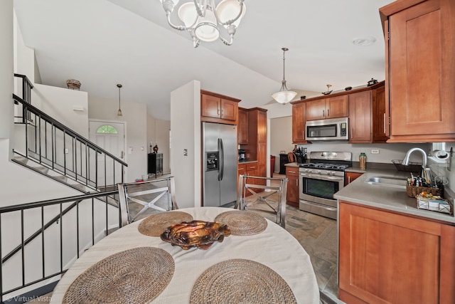 2243 Camden Ln, Hanover Park, IL 60133 - kitchen featuring stainless steel appliances, vaulted ceiling, a chandelier, brown cabinetry, and stone finish floors