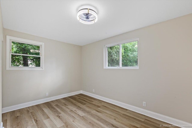 214 Marquette St, Park Forest, IL 60466 - unfurnished room with wood finished floors and baseboards