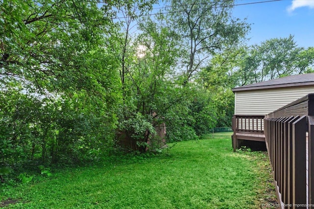 214 Marquette St, Park Forest, IL 60466 - view of green lawn with a deck
