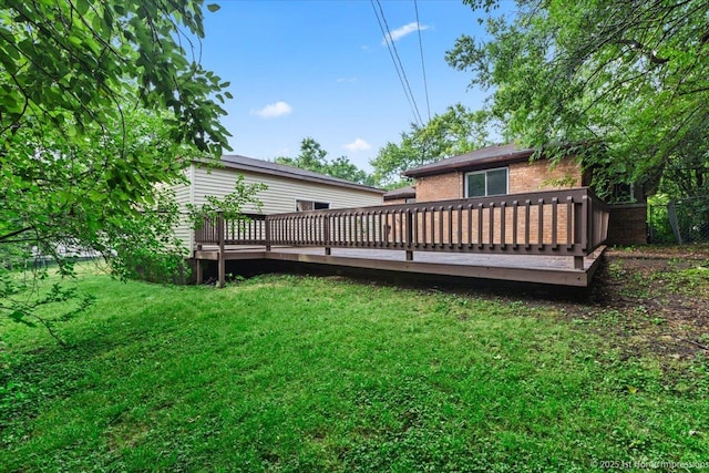 214 Marquette St, Park Forest, IL 60466 - rear view of house with a deck and brick siding