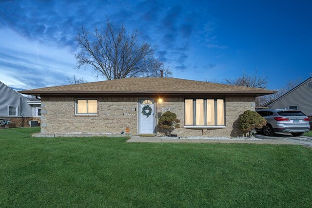 240 Miami St, Park Forest, IL 60466 - ranch-style home with a front yard, brick siding, and a shingled roof