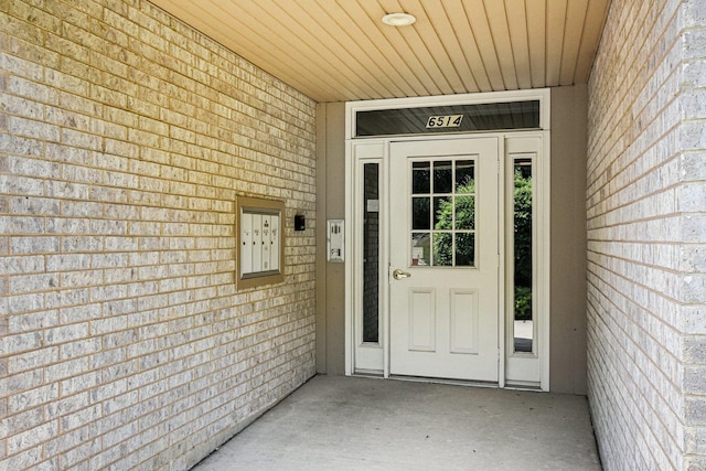 6514 Pine Trail Ln Unit 2, Tinley Park, IL 60477 - doorway to property with brick siding