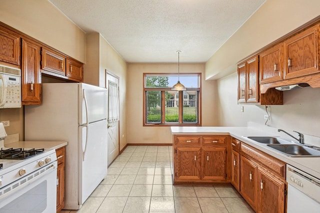 6514 Pine Trail Ln Unit 2, Tinley Park, IL 60477 - kitchen with white appliances, brown cabinets, a peninsula, light countertops, and a textured ceiling