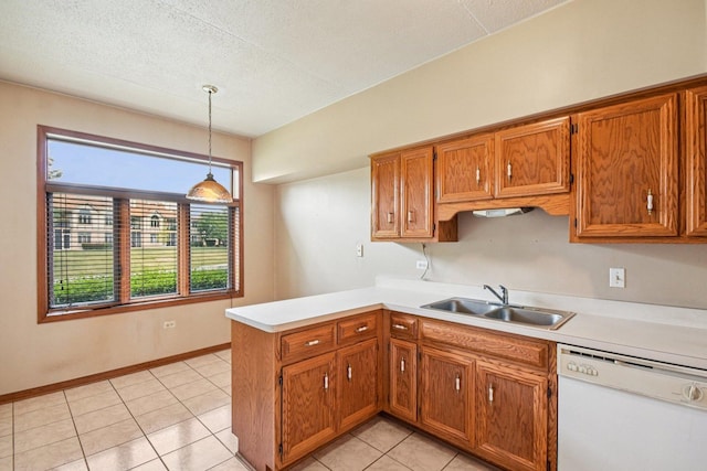 6514 Pine Trail Ln Unit 2, Tinley Park, IL 60477 - kitchen with dishwasher, a peninsula, brown cabinets, light countertops, and a textured ceiling