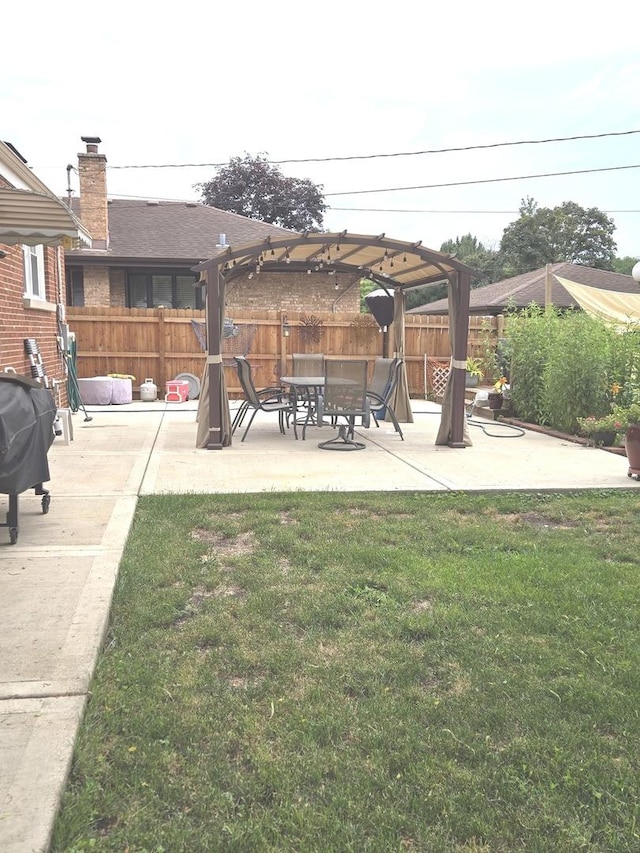 452 S Walnut St, Bensenville, IL 60106 - fenced backyard featuring a patio and a pergola