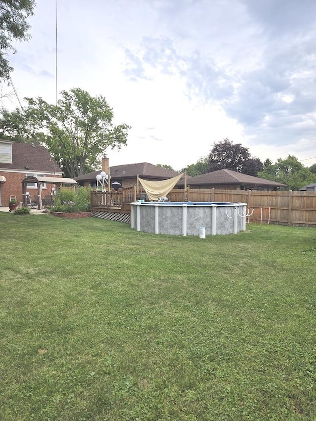452 S Walnut St, Bensenville, IL 60106 - view of yard featuring a covered pool and a deck