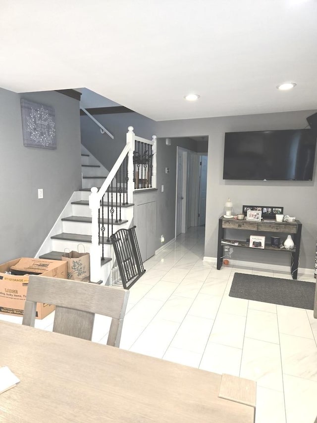 452 S Walnut St, Bensenville, IL 60106 - tiled living room with stairs and recessed lighting