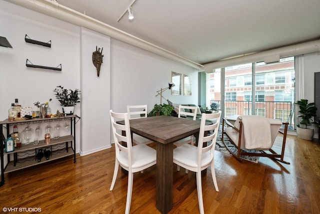 700 W Van Buren St Unit 803, Chicago, IL 60607 - dining area with wood finished floors and rail lighting