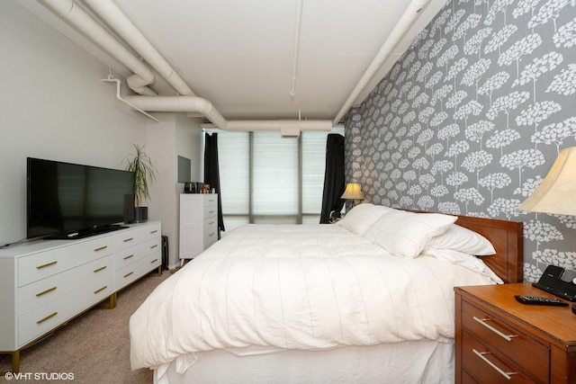 700 W Van Buren St Unit 803, Chicago, IL 60607 - bedroom with wallpapered walls and carpet floors
