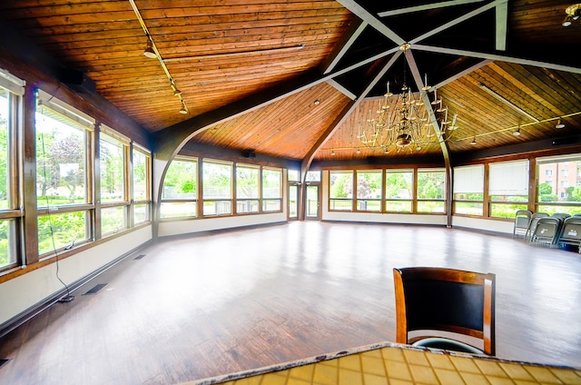 1206 S New Wilke Rd Unit 108, Arlington Heights, IL 60005 - unfurnished sunroom featuring rail lighting and healthy amount of natural light