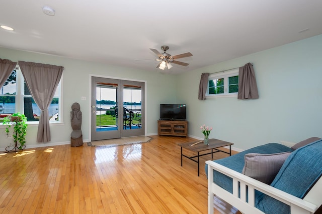 22869 W Lake Shore Dr, Antioch, IL 60002 - living room featuring healthy amount of natural light, ceiling fan, and hardwood / wood-style flooring
