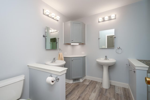 22869 W Lake Shore Dr, Antioch, IL 60002 - bathroom with wood finished floors and two sinks