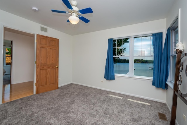 22869 W Lake Shore Dr, Antioch, IL 60002 - unfurnished bedroom with carpet and a ceiling fan