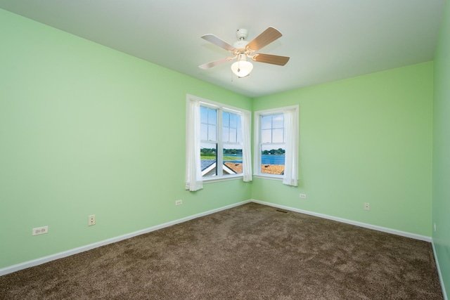 22869 W Lake Shore Dr, Antioch, IL 60002 - unfurnished room featuring dark carpet and ceiling fan