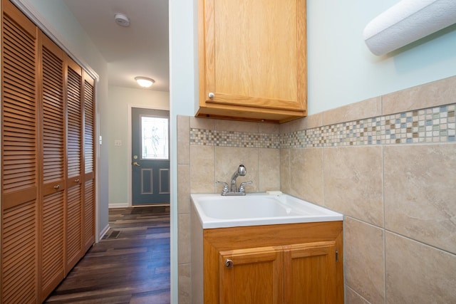 22869 W Lake Shore Dr, Antioch, IL 60002 - kitchen with light countertops, dark wood-style flooring, and tile walls