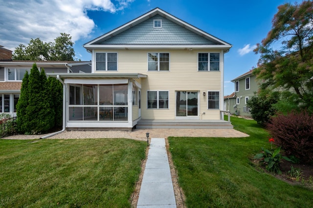 22869 W Lake Shore Dr, Antioch, IL 60002 - back of house featuring a lawn, a sunroom, and a patio area