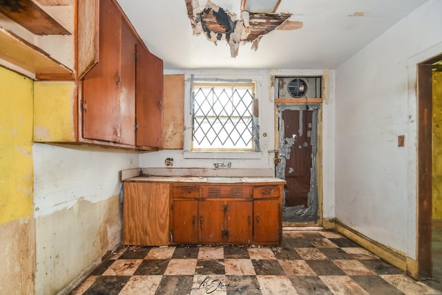 8645 S Bennett Ave, Chicago, IL 60617 - kitchen with light countertops and brown cabinets