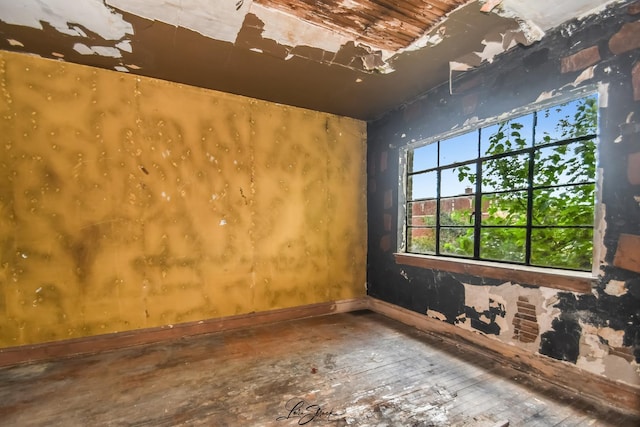 8645 S Bennett Ave, Chicago, IL 60617 - unfurnished room featuring hardwood / wood-style floors and baseboards