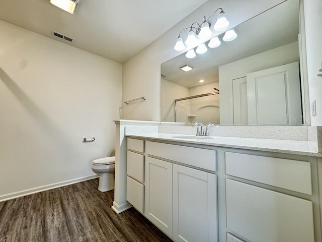 15041 W Quincy Cir, Manhattan, IL 60442 - full bath with wood finished floors, vanity, and a shower with door