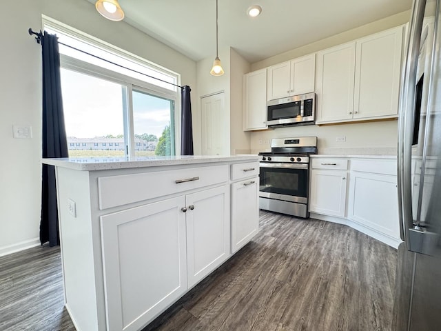 15041 W Quincy Cir, Manhattan, IL 60442 - kitchen featuring appliances with stainless steel finishes, dark wood-type flooring, white cabinets, and recessed lighting