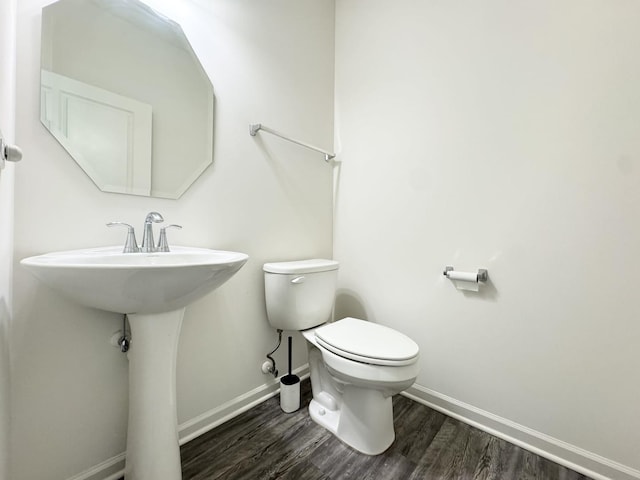 15041 W Quincy Cir, Manhattan, IL 60442 - bathroom featuring baseboards and wood finished floors