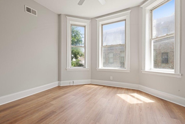 1643 S Millard Ave, Chicago, IL 60623 - unfurnished room featuring light wood-type flooring and ceiling fan