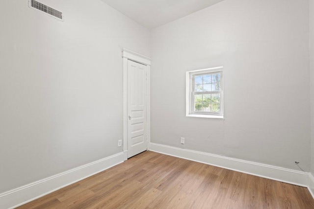 1643 S Millard Ave, Chicago, IL 60623 - spare room featuring light wood-style flooring and baseboards