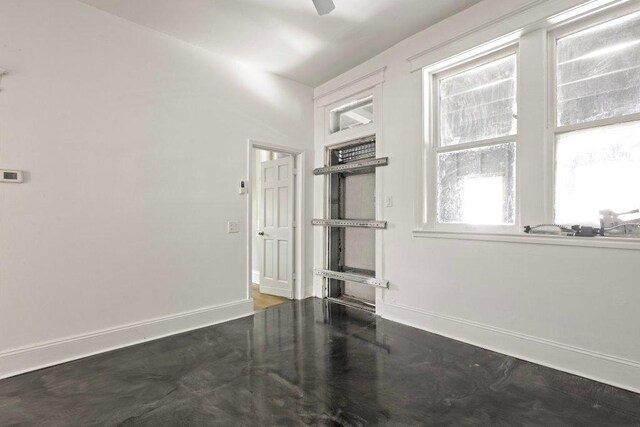 1643 S Millard Ave, Chicago, IL 60623 - unfurnished room with baseboards and wood finished floors