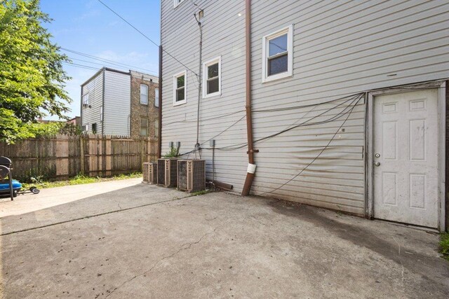 1643 S Millard Ave, Chicago, IL 60623 - view of side of property featuring a patio and a cooling unit