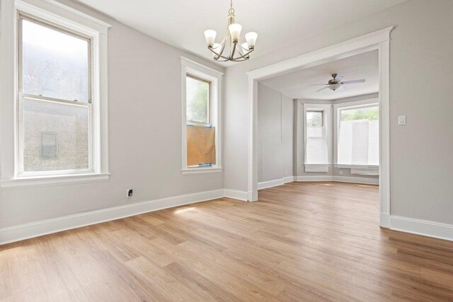 1643 S Millard Ave, Chicago, IL 60623 - unfurnished room with light wood-type flooring and a chandelier