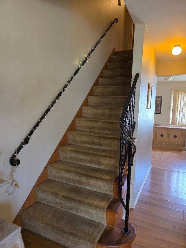 264 Bay St, Wood Dale, IL 60191 - stairs featuring wood finished floors and baseboards