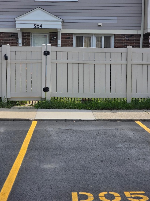 264 Bay St, Wood Dale, IL 60191 - uncovered parking lot featuring a gate