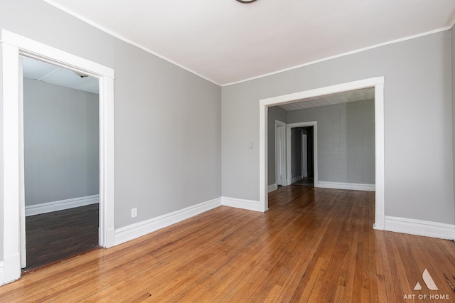 1229 E 71st St, Chicago, IL 60619 - spare room featuring ornamental molding and hardwood / wood-style floors