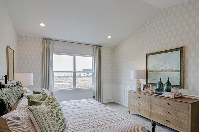 1647 Patterson Ave, North Aurora, IL 60542 - bedroom with wallpapered walls, wainscoting, lofted ceiling, light carpet, and recessed lighting