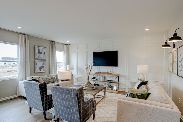 1647 Patterson Ave, North Aurora, IL 60542 - living room featuring a decorative wall, healthy amount of natural light, light wood finished floors, and recessed lighting