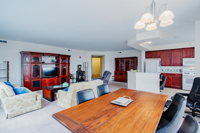 8300 Callie Ave Unit 314, Morton Grove, IL 60053 - dining room with a chandelier and light carpet