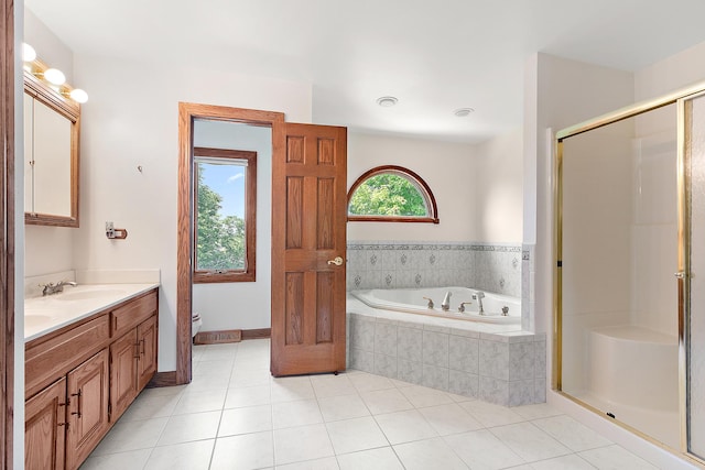 21978 Princeton Cir, Frankfort, IL 60423 - bathroom featuring double vanity, a bath, a shower stall, and tile patterned floors