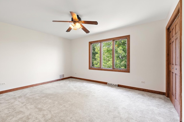 21978 Princeton Cir, Frankfort, IL 60423 - unfurnished bedroom with a closet, light carpet, and a ceiling fan
