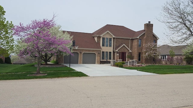21978 Princeton Cir, Frankfort, IL 60423 - view of front of house with brick siding, concrete driveway, a chimney, and a front lawn