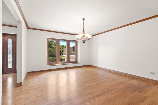 21978 Princeton Cir, Frankfort, IL 60423 - empty room featuring a chandelier, light wood-style floors, and crown molding