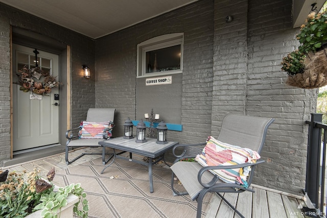 6928 Pershing Rd, Berwyn, IL 60402 - property entrance featuring a porch and brick siding