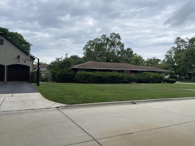 3900 Clausen Ave, Western Springs, IL 60558 - view of grassy yard with concrete driveway and a garage