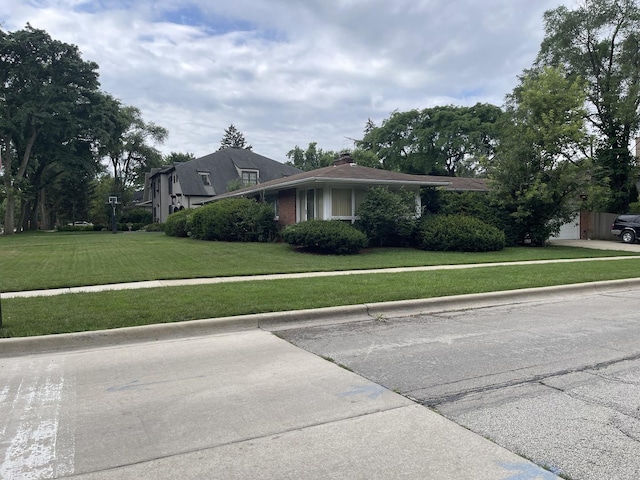 3900 Clausen Ave, Western Springs, IL 60558 - view of front of house with a front lawn and a chimney