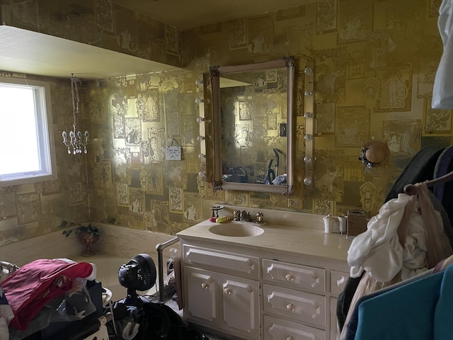 3900 Clausen Ave, Western Springs, IL 60558 - bathroom featuring vanity, wallpapered walls, and a garden tub