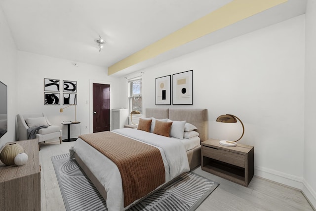 5019 N Kostner Ave, Chicago, IL 60630 - bedroom featuring light wood-type flooring and baseboards