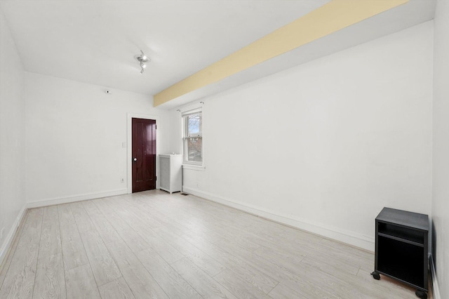 5019 N Kostner Ave, Chicago, IL 60630 - empty room featuring wood finished floors and baseboards