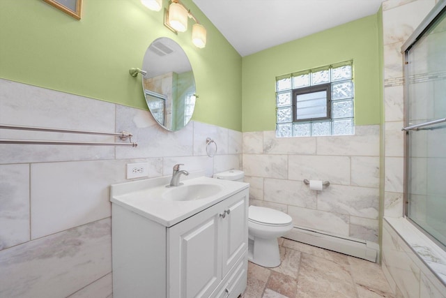 5019 N Kostner Ave, Chicago, IL 60630 - full bath featuring a baseboard radiator, tile walls, vanity, tiled shower, and wainscoting