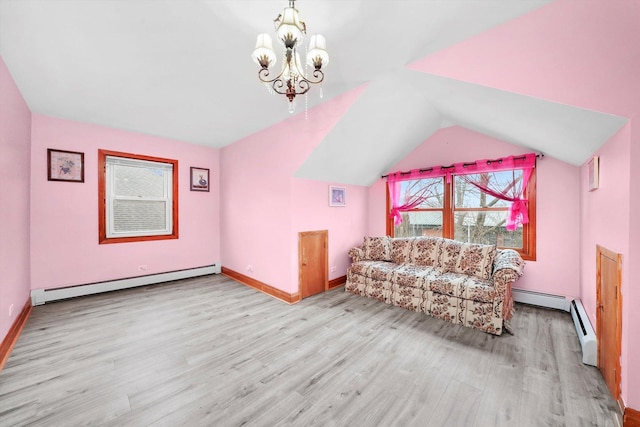 5019 N Kostner Ave, Chicago, IL 60630 - living area with a baseboard radiator, wood finished floors, a chandelier, and vaulted ceiling