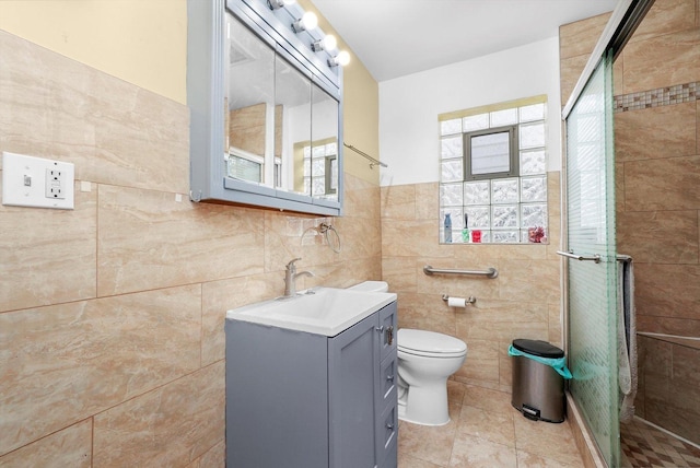 5019 N Kostner Ave, Chicago, IL 60630 - full bath featuring tile walls, a stall shower, vanity, and tile patterned floors